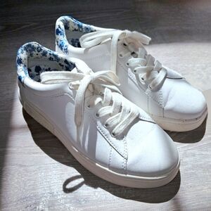 Kate Spade New York Lift Sneakers In White Nappa Leather with Blue Floral Accent